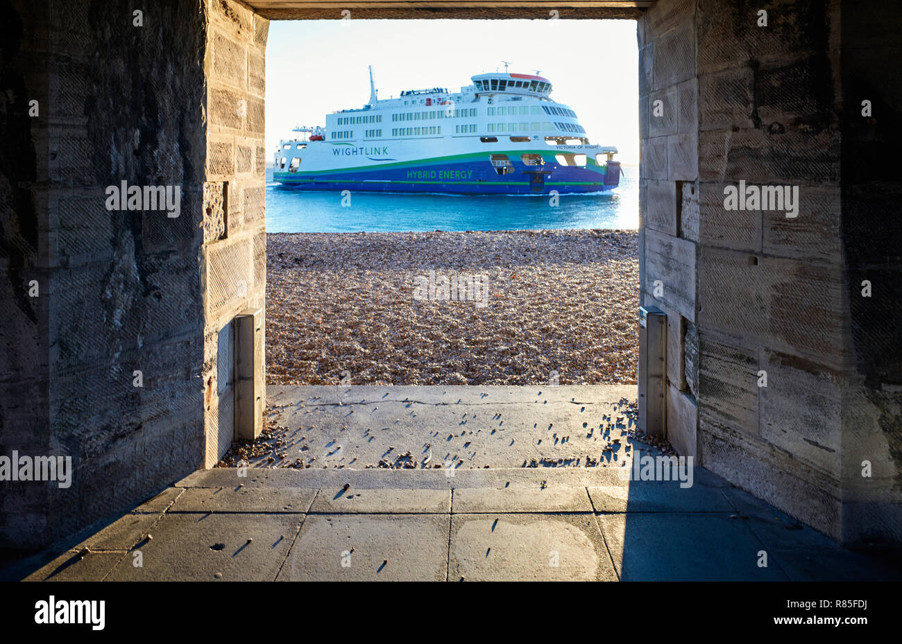 Wightlink car ferry ‘Victoria of Wight’ framed in doorway at Sally Port near the entrance to Portsmouth Harbour Stock Photo