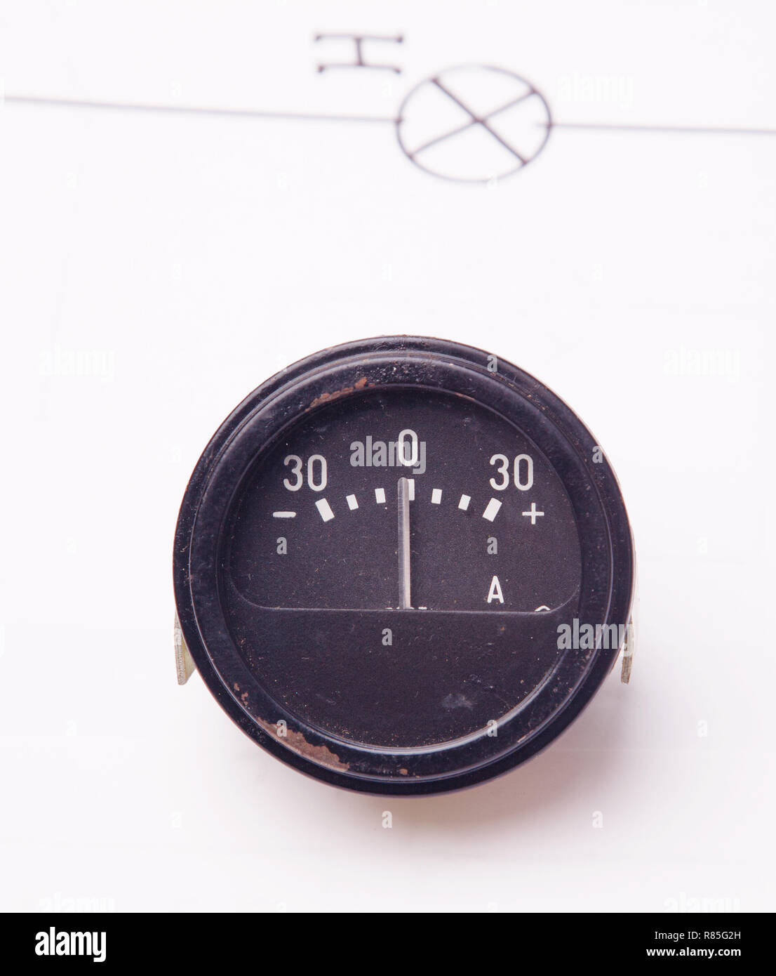 Old car ammeter on a background of the electric scheme Stock Photo