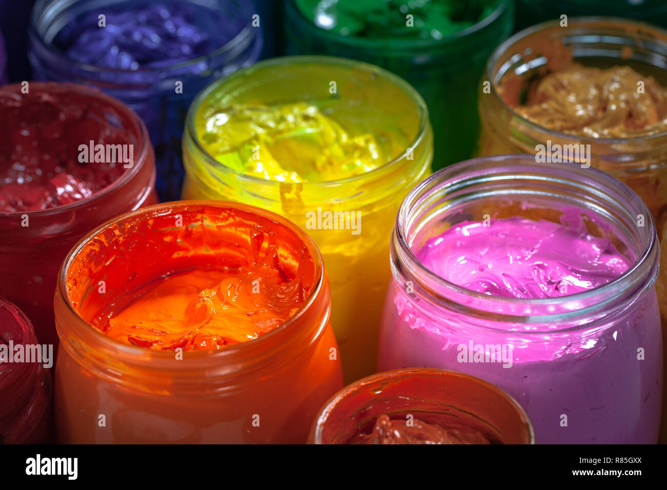 orange and pink colors of screen printing ink for print on tee shirts