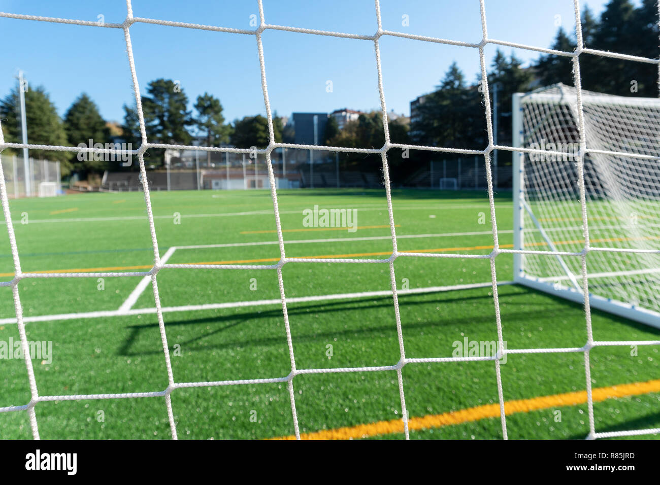 Soccer field and gate with an artificial turf field. Soft focus, bokeh. Soccer background Stock Photo