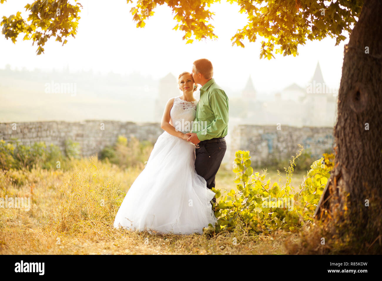 Young Happy wedding couple Stock Photo - Alamy