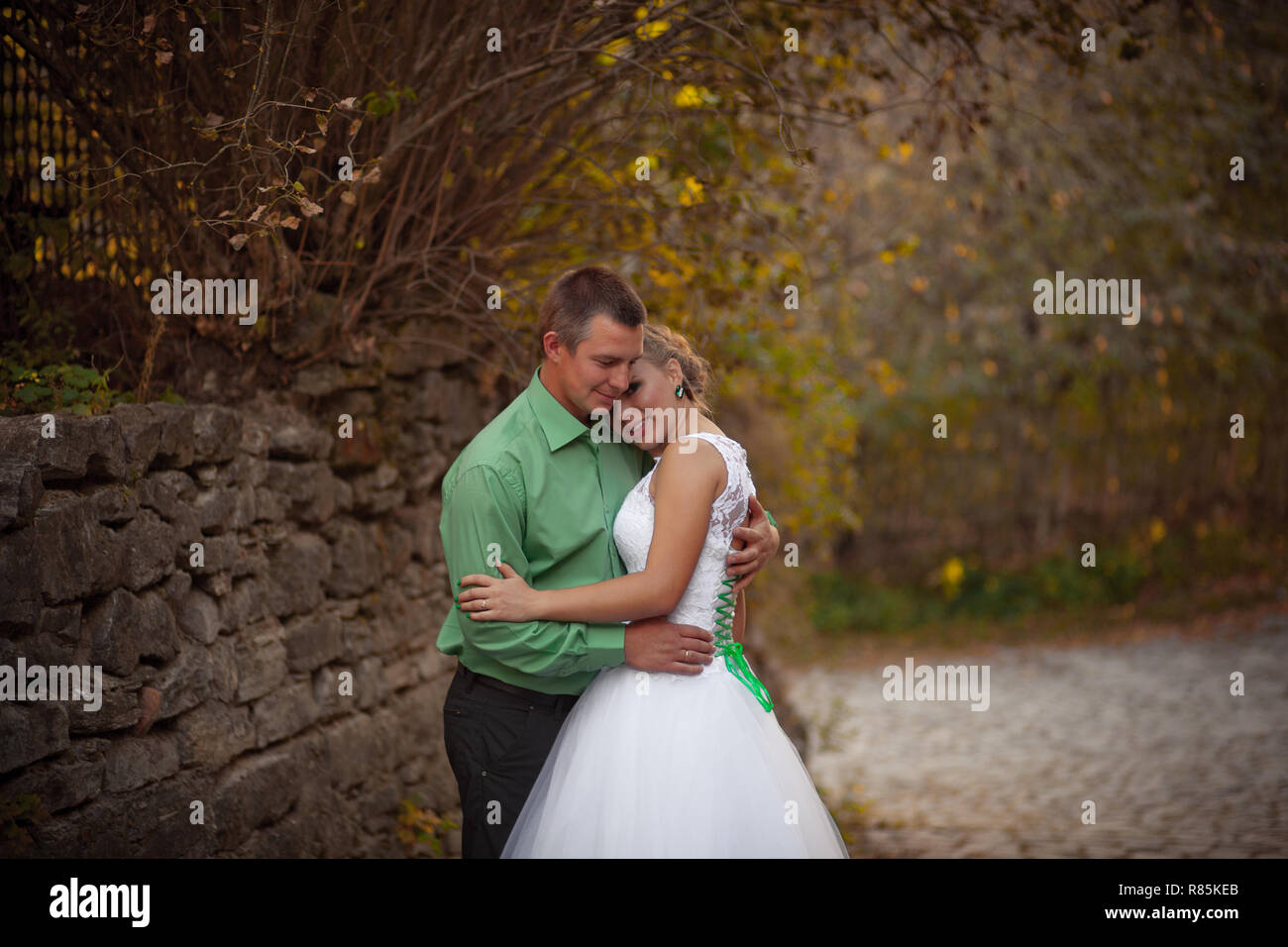 Young Happy wedding couple Stock Photo - Alamy