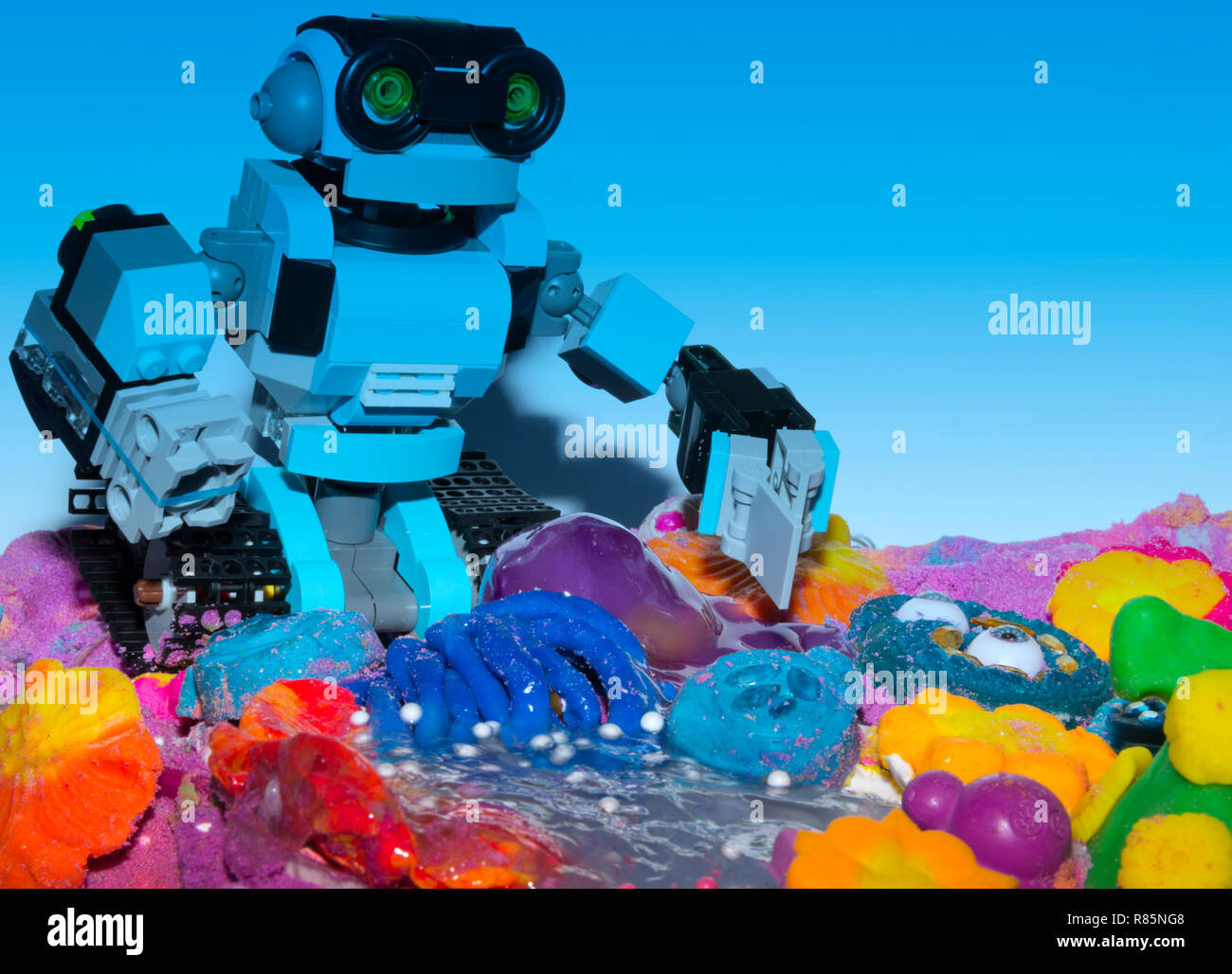 Lego robot exploring alien world Stock Photo