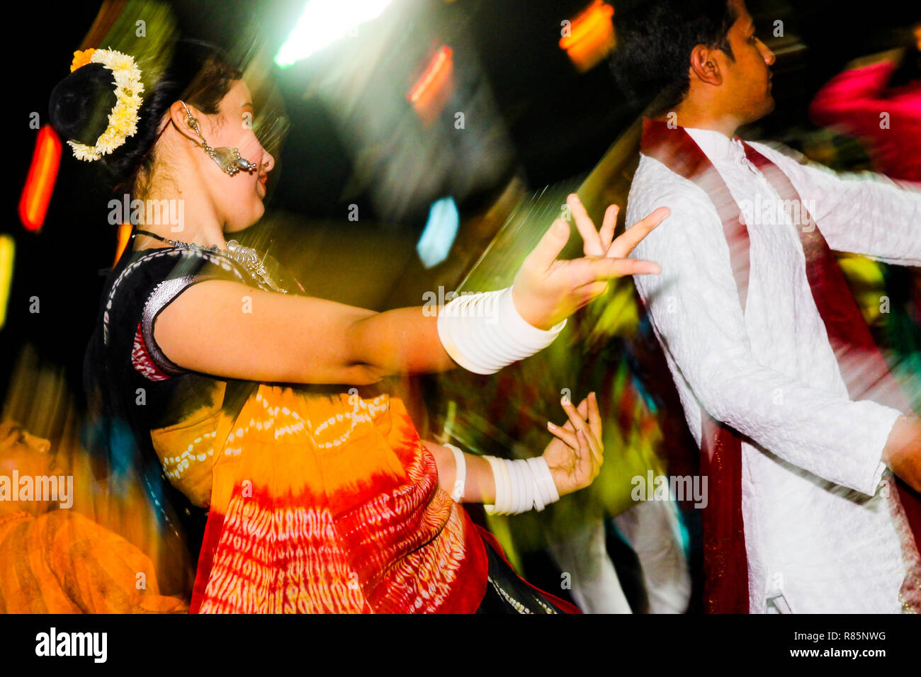 Vadodara, India - 20 october 2018: men and women in traditional indian dresses dance garba during hindu navratri festival expressing movement and joy Stock Photo