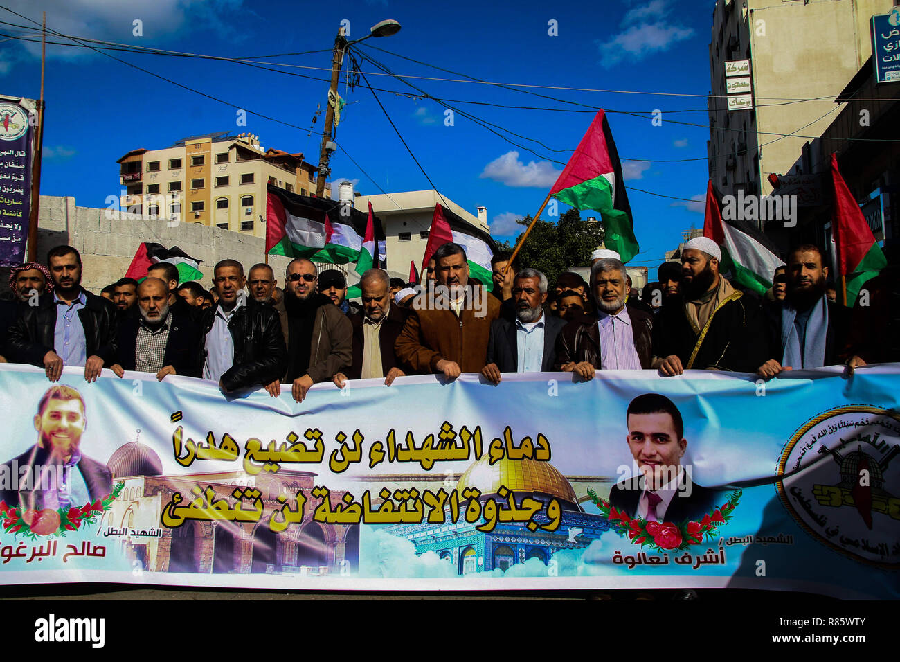 December 13, 2018 - Different Palestinian factions organise a mass demonstration in Gaza for two Palestinian young men, Ashraf Walid Suleiman Na'alwa and Saleh Omar Barghouti, killed during Israeli raids in Nablus and near Ramallah in the early morning of Thursday 13th December 2018. The two Palestinian killed were suspected by the Israeli authorities to be part of the cell that injured seven Israeli civilians near the Ofra Israeli settlement in the northern West Bank early in the week Credit: Ahmad Hasaballah/IMAGESLIVE/ZUMA Wire/Alamy Live News Stock Photo