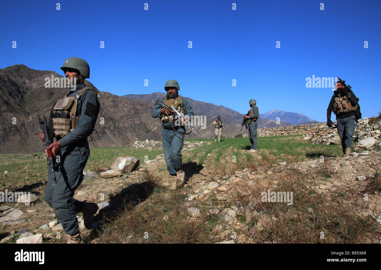 Assadabad, Afghanistan. 13th Dec, 2018. Afghan security force members take part in a military operation in Kunar province, Afghanistan, Dec. 13, 2018. Eight militants including a commander affiliated with the Islamic State (IS) outfit have been killed in the eastern Kunar province, an army commander in the province, Mirwais Sapi, said Thursday. Credit: Emran Waak/Xinhua/Alamy Live News Stock Photo