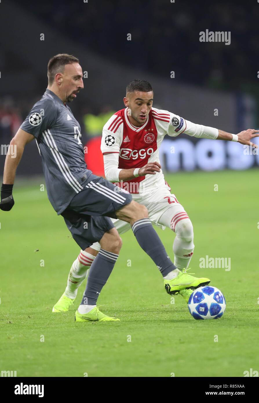 Amsterdam, Netherlands. 12th December, 2018. Franck Ribery (Bayern Munich)  and Hakim Ziyech (Ajax Amsterdam) during the UEFA Champions League, Group E  football match between Ajax and Bayern Munich on December 12, 2018