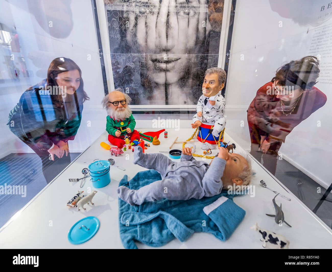 London, UK. 13th December, 2018. Baby Artists, incl Damien Hirst, by Valter Adam Casotto a prosthetic makeup artist for over 20 episodes of Games of Thrones, as well as Harry Potter and the Deathly Hallows (the Gringott goblins), The Hobbit (Bombur, Kili and several Orcs), Tale of Tales, and X-Men: First Class - Beyond Reality (13th – 28th December), a collective show of world-leading hyperrealist artists at Opera Gallery, New Bond Street. Credit: Guy Bell/Alamy Live News Stock Photo