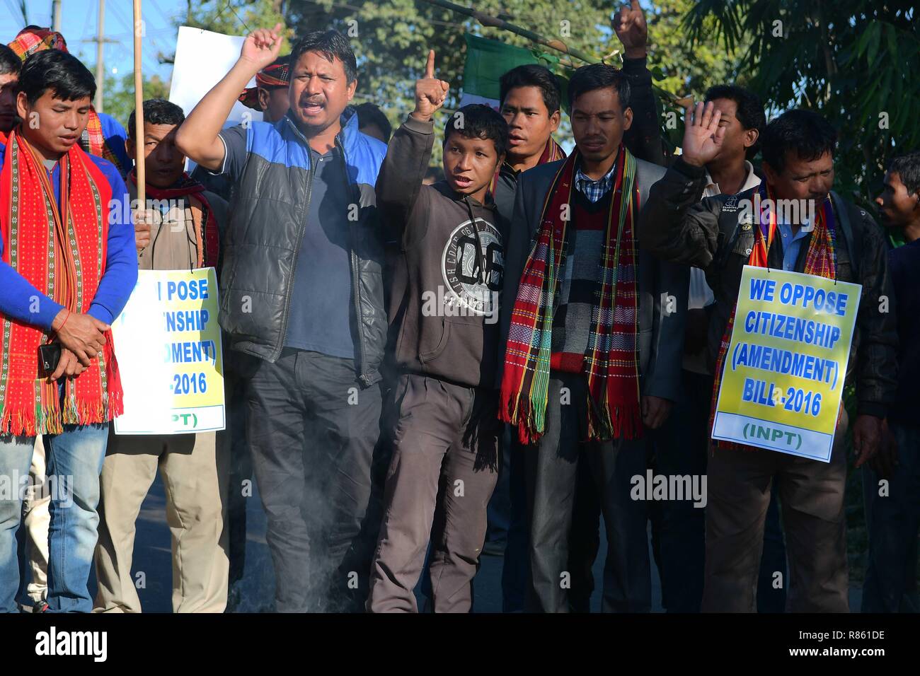 Agartala, Tripura, India. 10th Dec, 2018. Protesters are seen chanting slogans during the protest.INPT (Indigenous Nationalist Party of Twipra) leaders and supporters protest on the National High way in Khamtingbari, 40 km far from Agartala city to demand for the withdrawal of Citizenship Bill that was Introduced in July 19 in Lok Sabha, the Citizenship Amendment Bill 2016 seeks to allow illegal migrants from certain minority communities in Afghanistan, Bangladesh and Pakistan eligible for Indian citizenship. In other words, it amends the Citizenship Act of 1955. (Credit Image: © Abhisek Stock Photo
