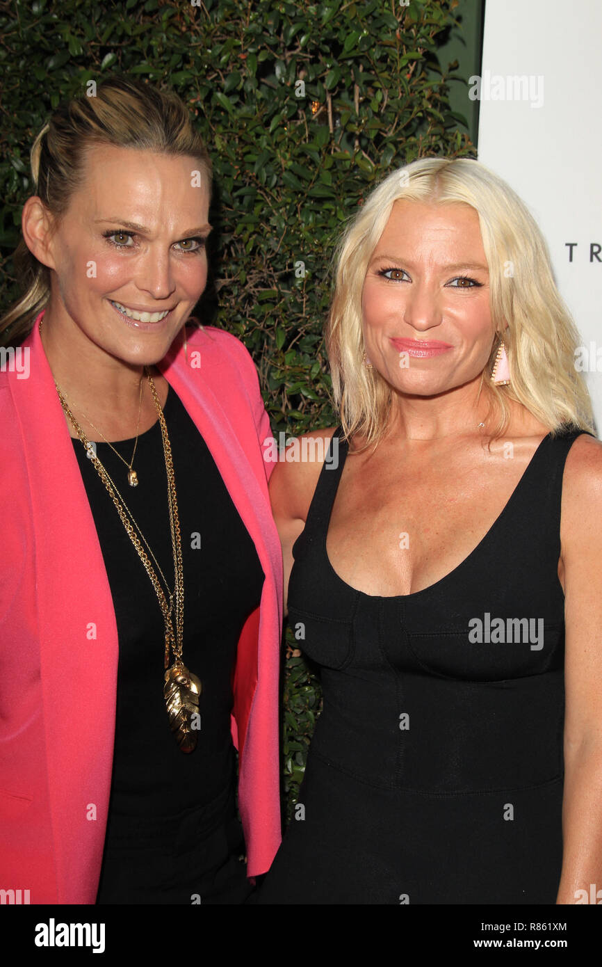 BRENTWOOD, CA APRIL 04 Tracy Anderson Molly Sims attends the opening