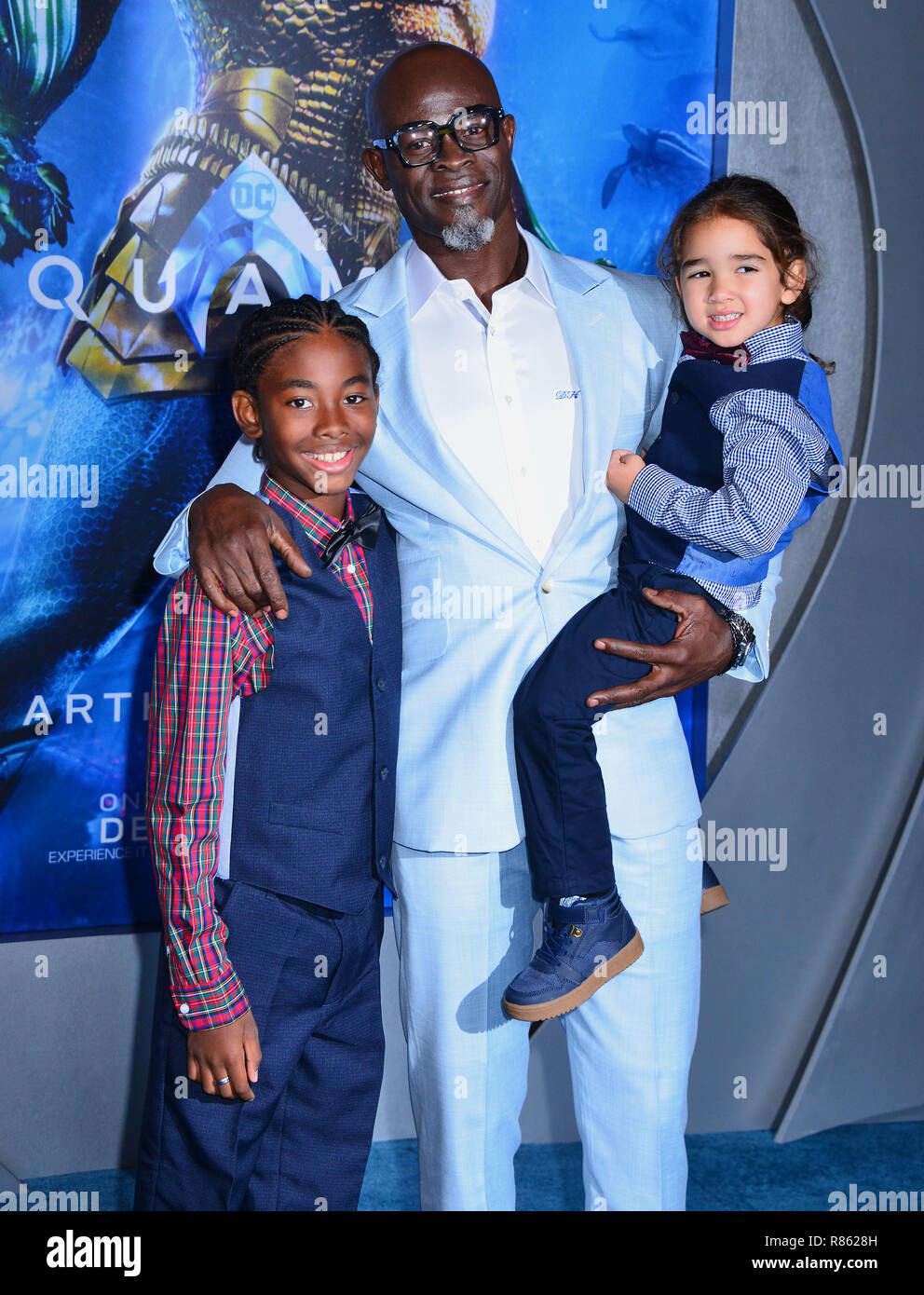 Djimon Hounsou and kids arrives at the Premiere Of Warner Bros