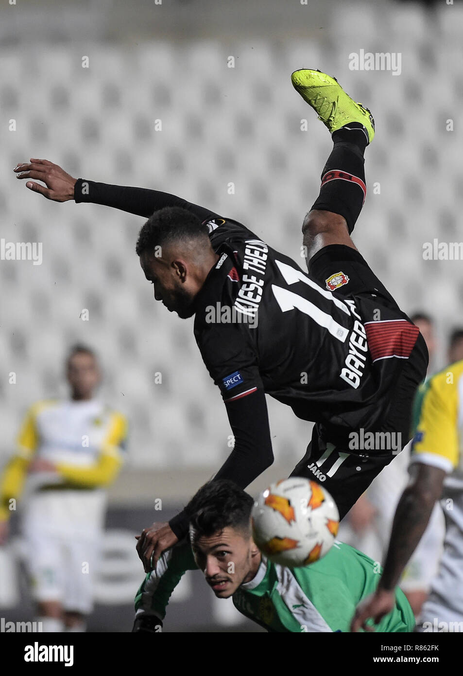 Nikosia, Cyprus. 13th Dec, 2018. Soccer: Europa League, Group stage, Group  A, Matchday 6: AEK Larnaca - Bayer Leverkusen at the GSP Stadium: Isaac  Kiese Thelin of Leverkusen (top) and goalkeeper Andreas
