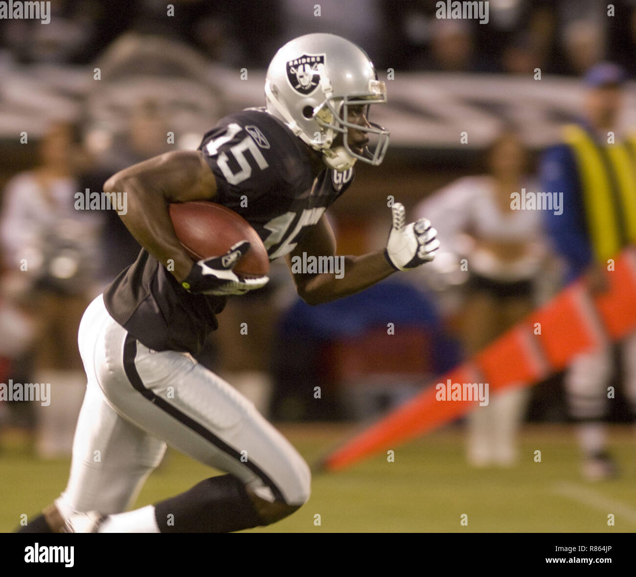 Oakland, California, USA. 8th Sep, 2008. Oakland Raiders wide receiver Johnnie Lee Higgins make 74 yard runback on Monday, September 8, 2008, at Oakland-Alameda County Coliseum in Oakland, California. The Broncos defeated the Raiders 41-14. Credit: Al Golub/ZUMA Wire/Alamy Live News Stock Photo