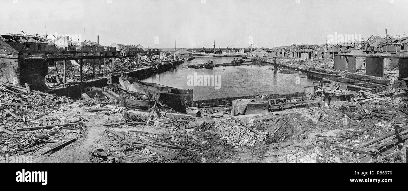 The destroyed Huskisson Dock No 2, following the  explosion of  1,000 tons of shells and bombs in the hold  of the merchant ship, 'Malakand' on 2nd May, 1940 during the Blitz by the Luftwaffe in World War Two, Liverpool, Merseyside, England. Stock Photo