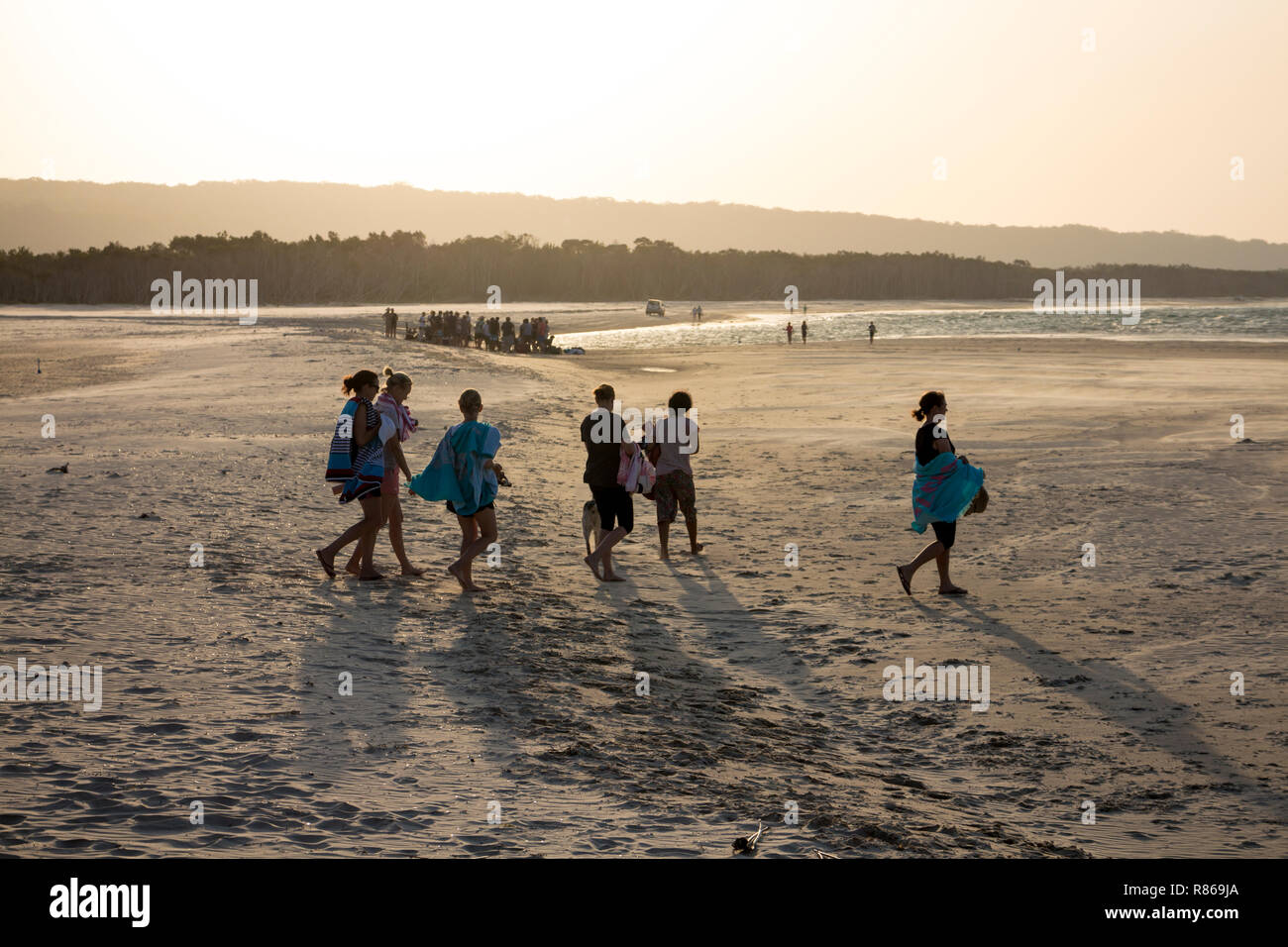 A group of teenagers on Flinders Beach, North Stradbroke Island, Queensland, Australia Stock Photo