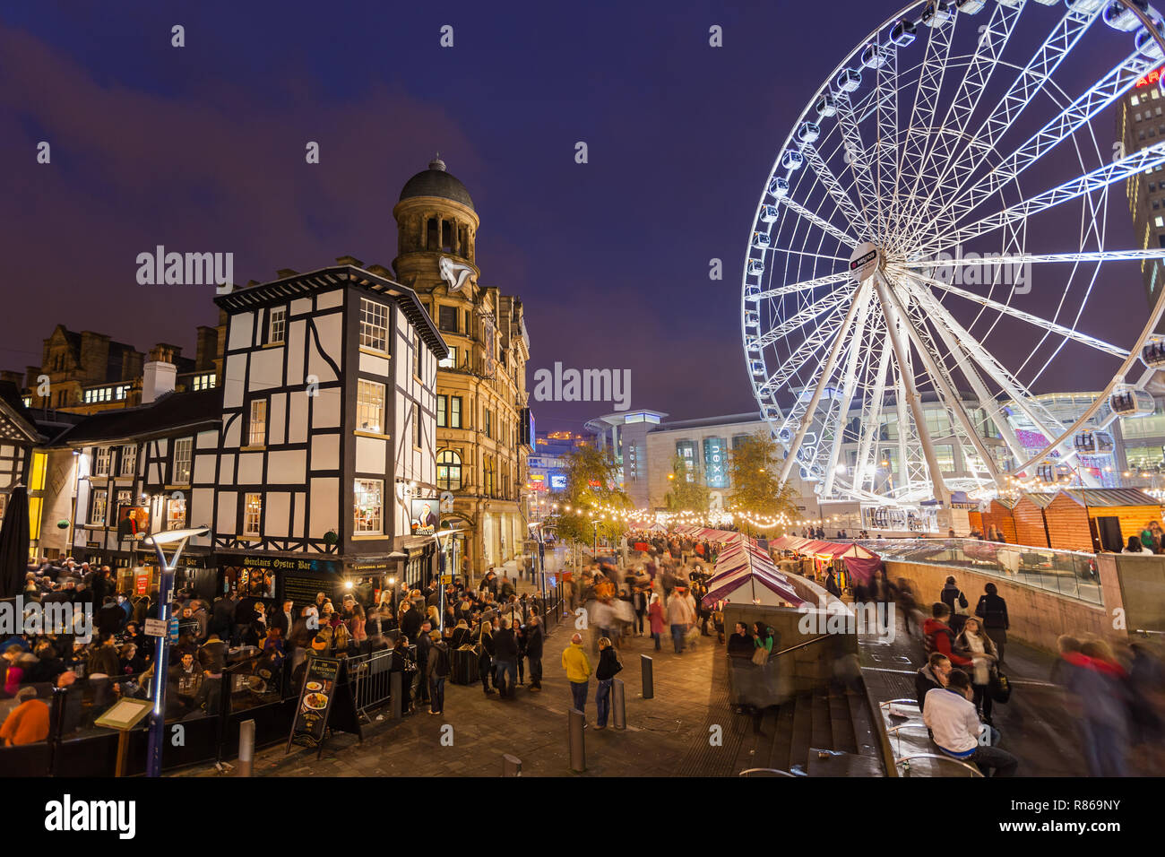 The Old Wellington Inn and Christmas market in Manchester UK Stock Photo
