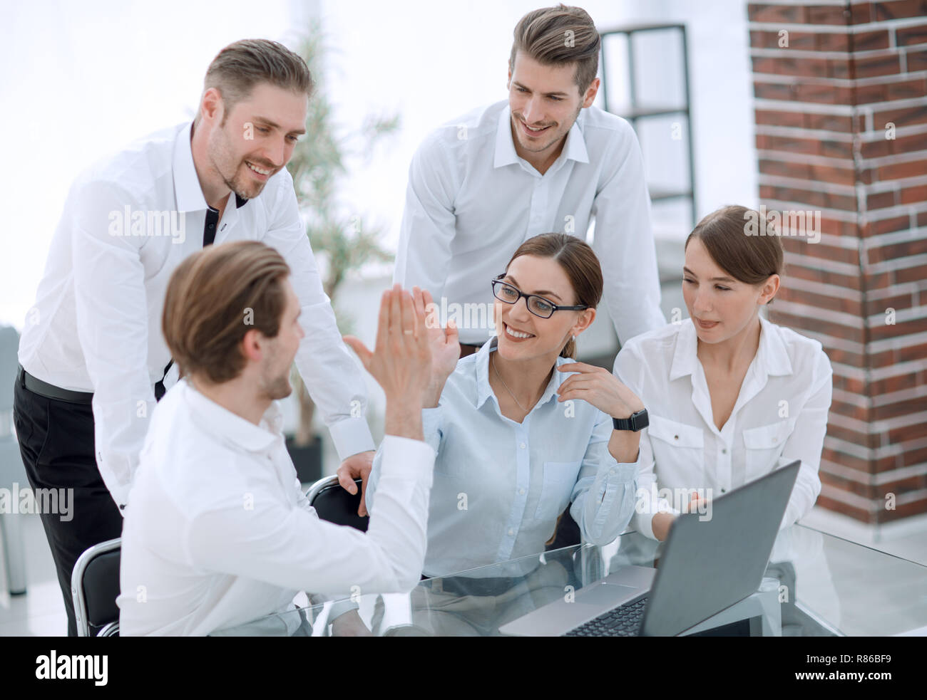 happy business showing their success Stock Photo - Alamy