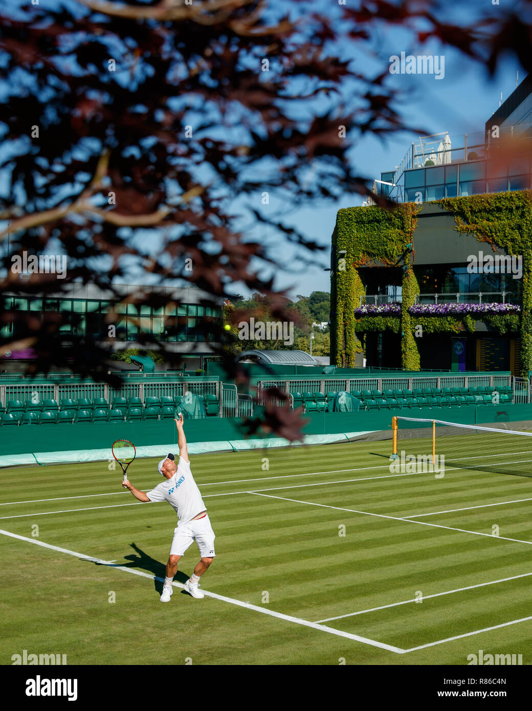 General view of the outside courts with Lleyton Hewitt in action during the Wimbledon Championships 2018 Stock Photo