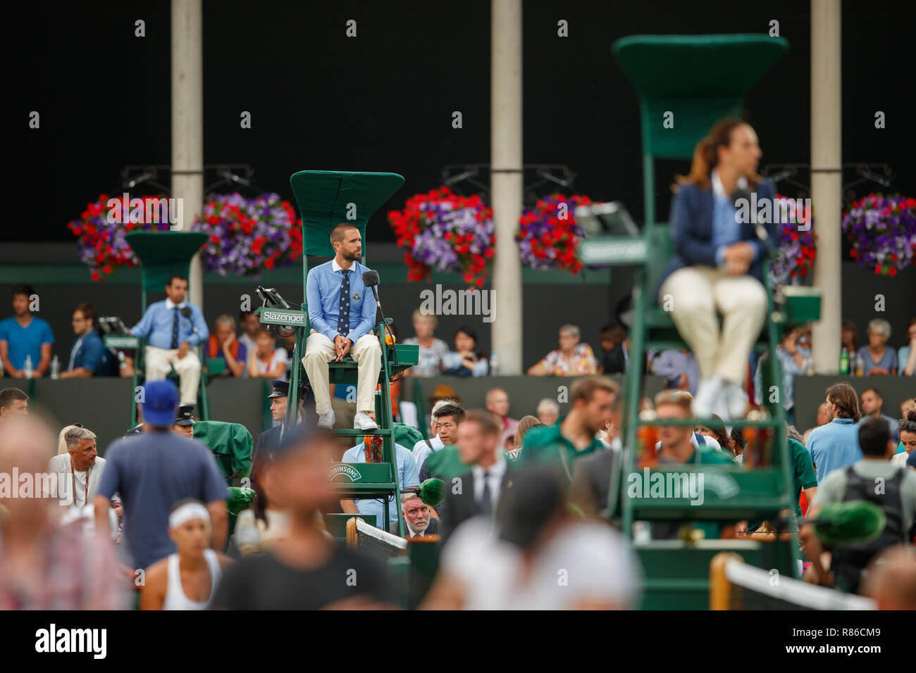Color image of Umpires on court during the Wimbledon Championships 2018 Stock Photo