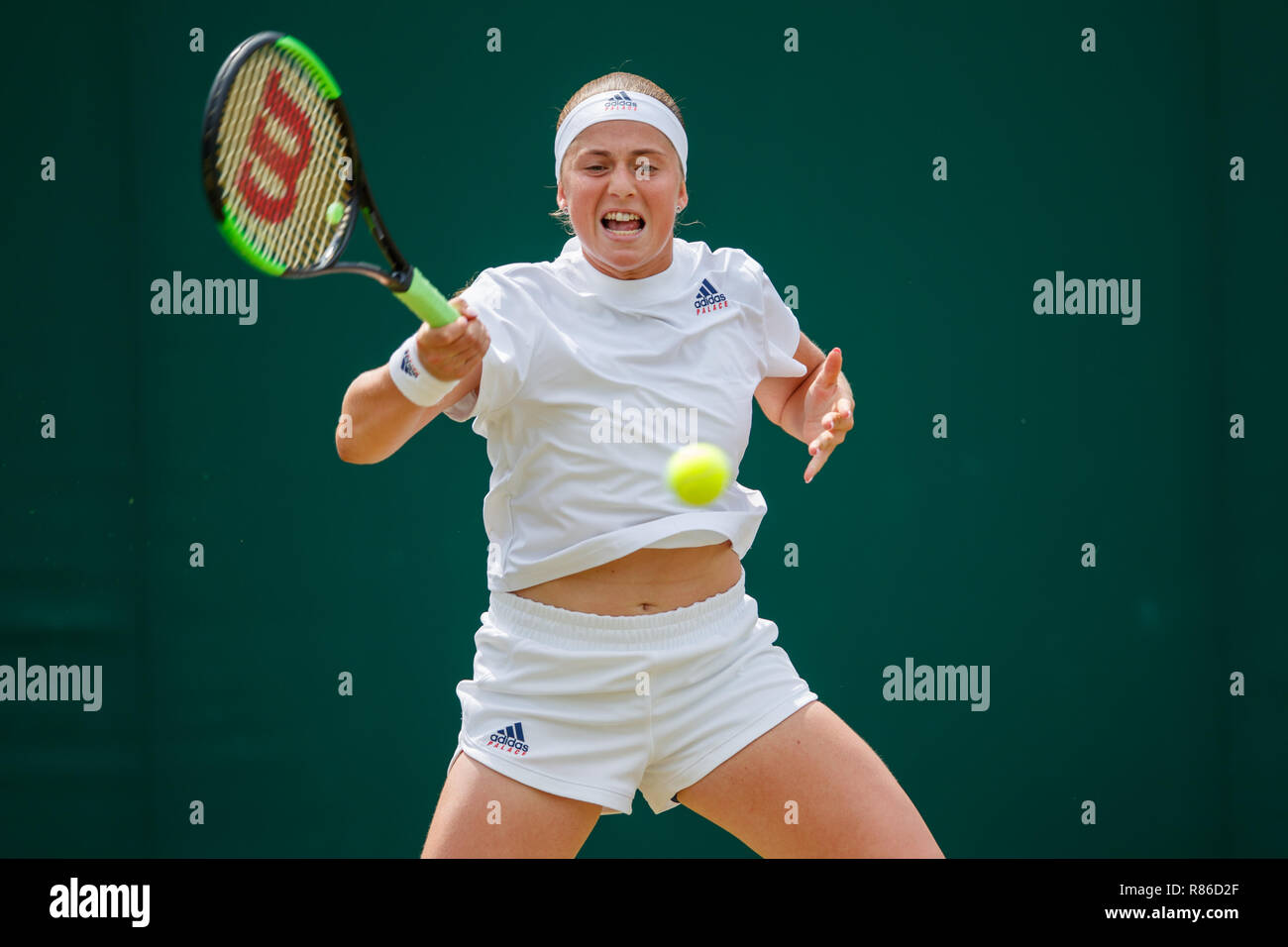 Jelena Ostapenko of Latvia in action during the Wimbledon Championships 2018 Stock Photo