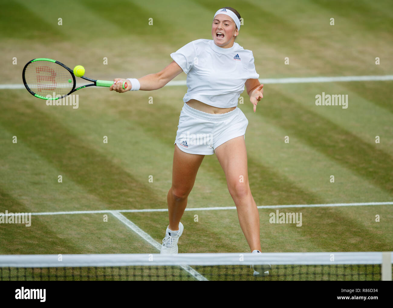 Jelena Ostapenko of Latvia in action during the Wimbledon Championships 2018 Stock Photo