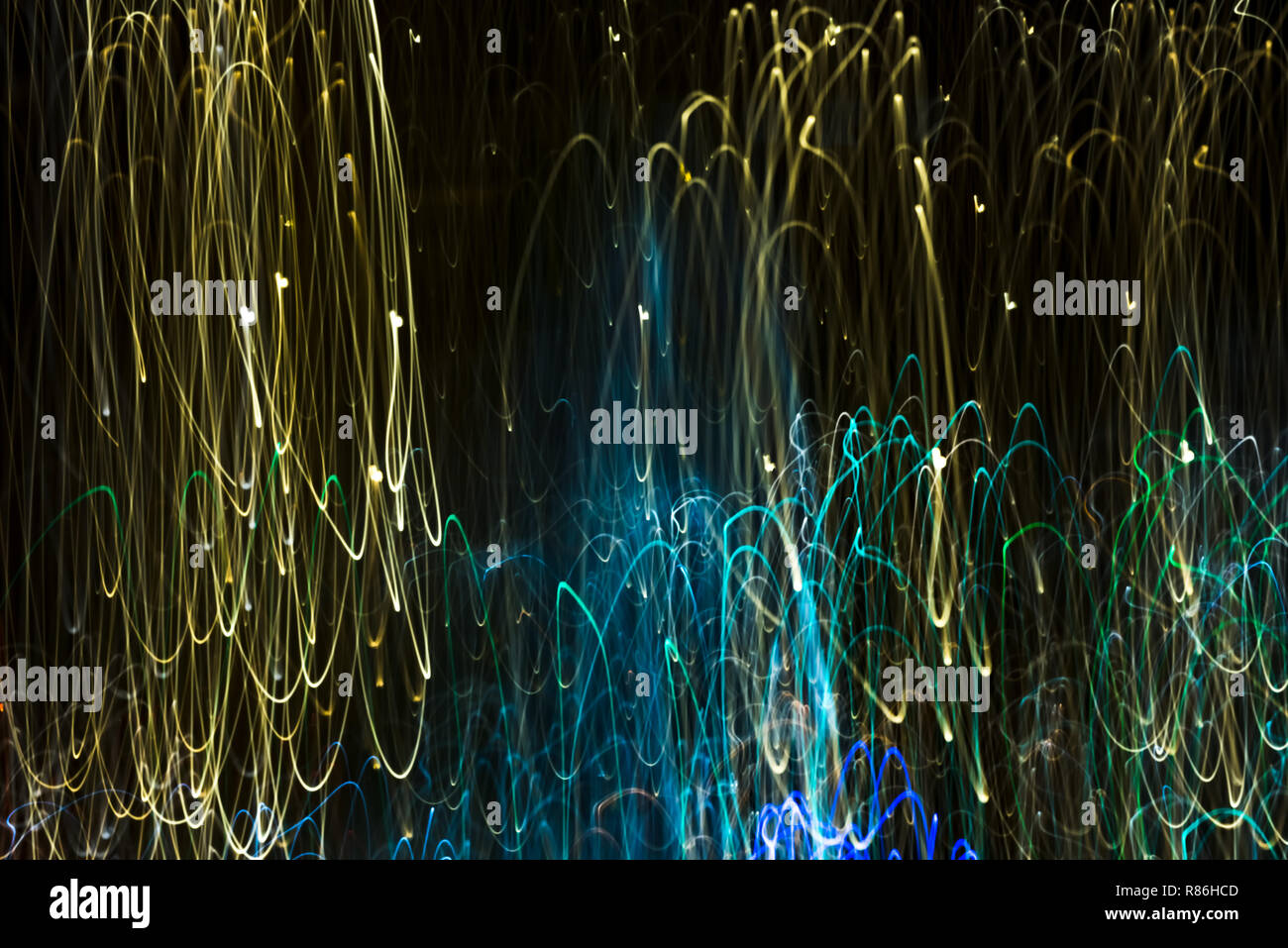 Bright abstract strip patterns from light strips on a black background Stock Photo
