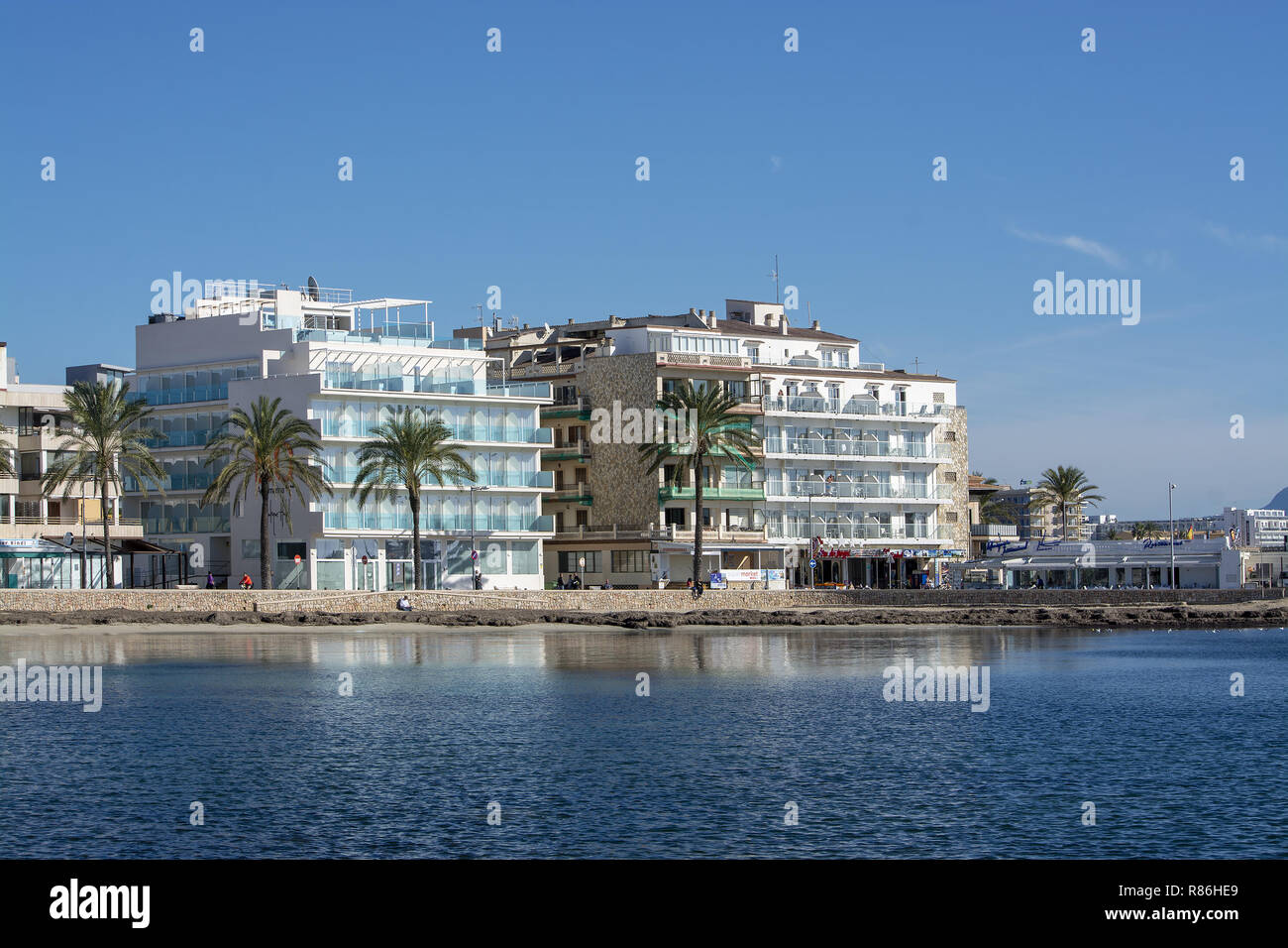 PALMA DE MALLORCA, SPAIN - DECEMBER 6, 2018: Winter calm blue water in front of BQ Aquamarina Hotel on December 6, 2018 in Palma de Mallorca, Spain. Stock Photo
