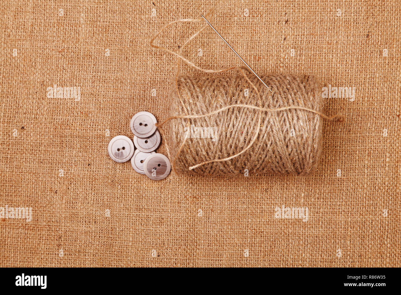 Ball of yarn burlap background Stock Photo