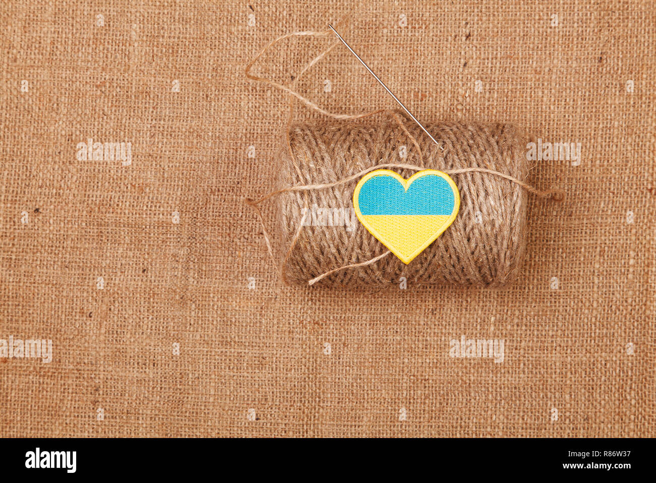 Ball of yarn burlap background Stock Photo