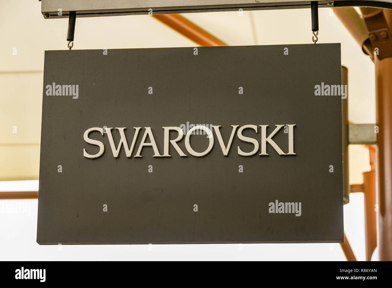 SEATTLE, WA, USA - JUNE 2018: Close up view of a sign outside the Swarovski factory store at the Premium Outlets shopping mall in Tulalip near Seattle Stock Photo