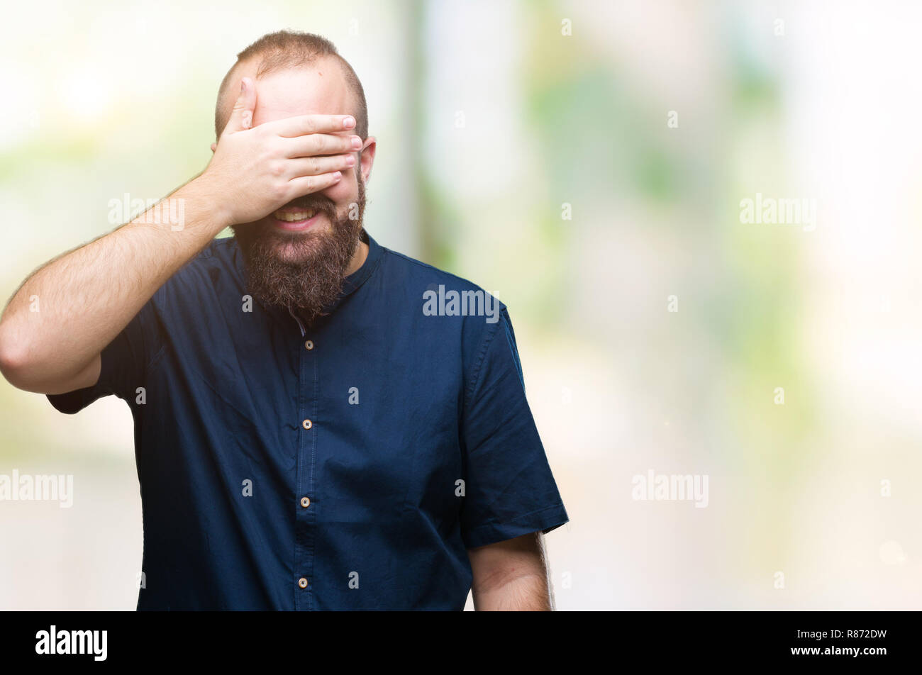 Young caucasian hipster man over isolated background smiling and ...