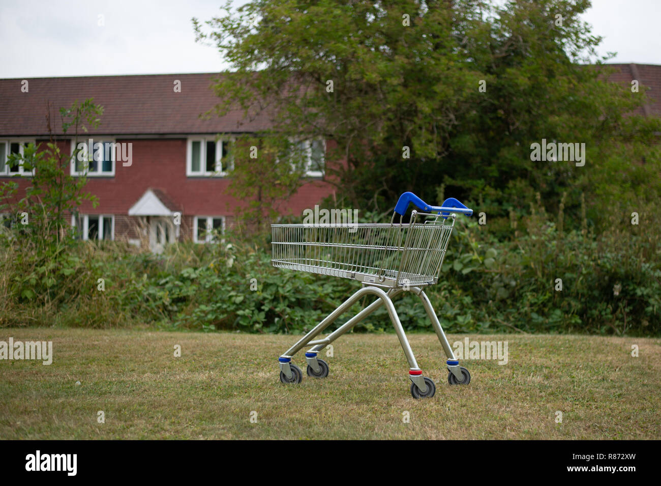 Abandoned shopping trolley in the afflent Hampshire town of Petersfield Stock Photo