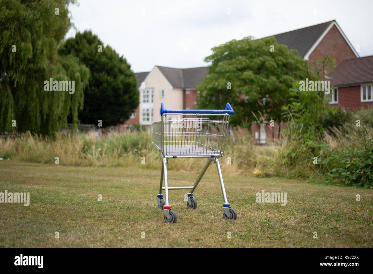 Abandoned shopping trolley in the afflent Hampshire town of Petersfield Stock Photo