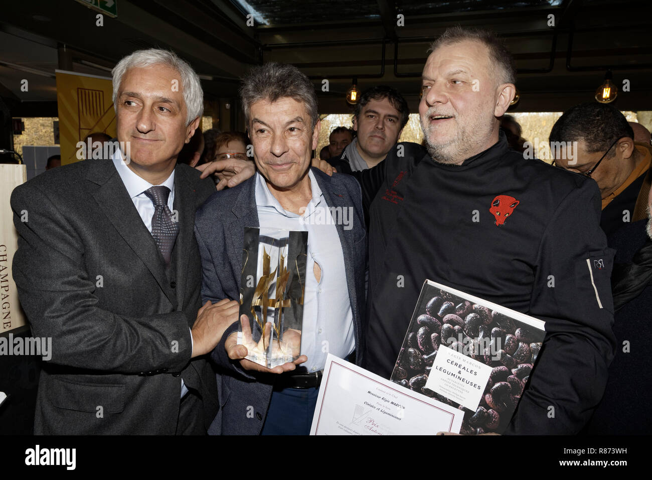 Paris, France. 12th Dec, 2018. Stéphane Layani, Régis Marcon winner of the Prix littéraire de la gastronomie Antonin Carême 2018 and Philippe Renard a Stock Photo