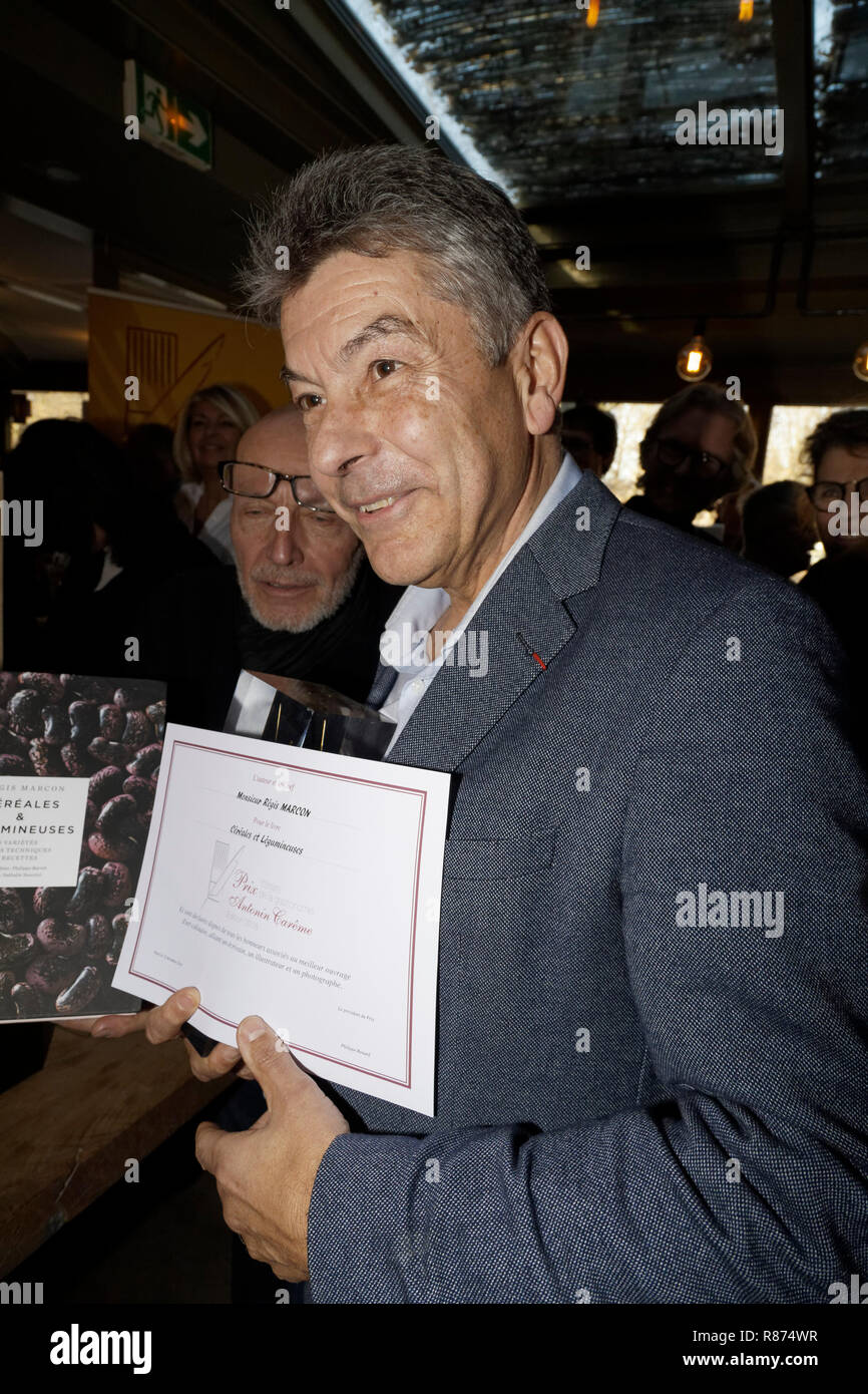 Paris, France. 12th Dec, 2018. Régis Marcon winner of the Prix littéraire de la gastronomie Antonin Carême 2018 for his book 'Cereals and legumes' pub Stock Photo