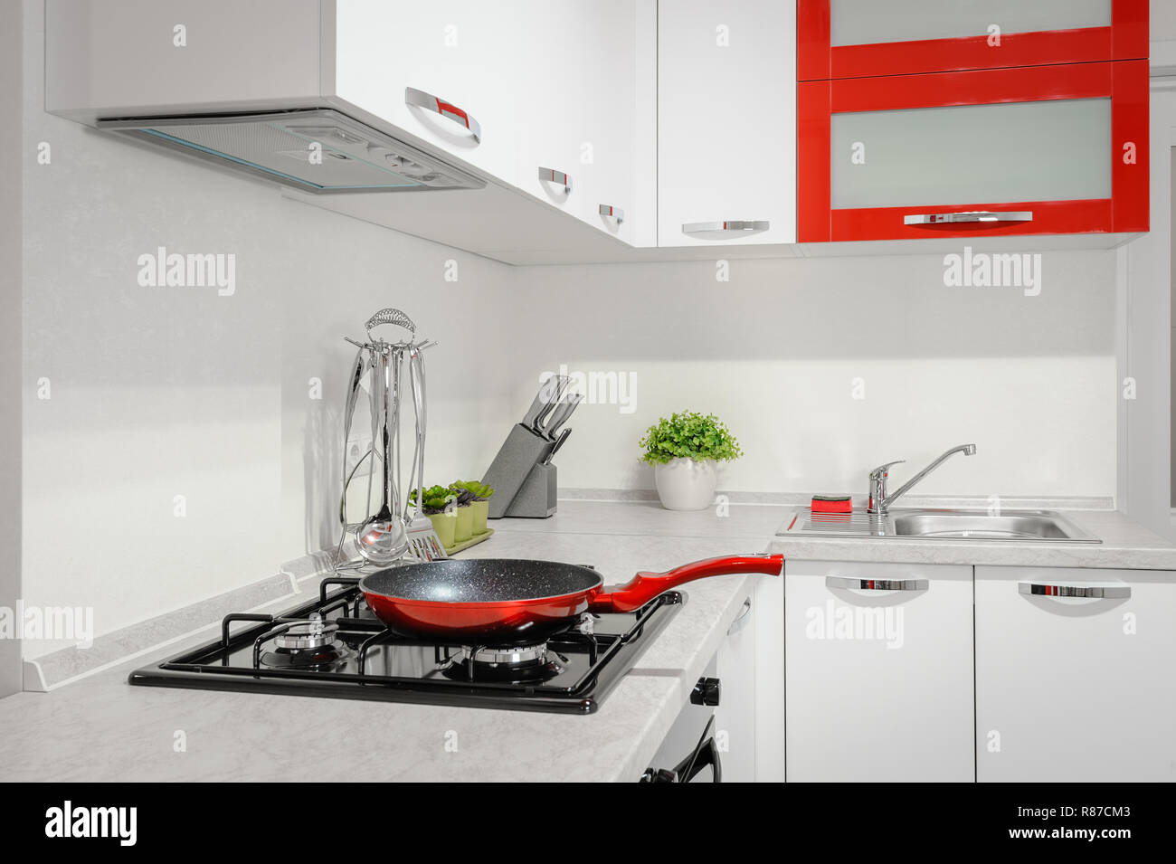 Modern Red And White Kitchen Interior Stock Photo 228815667