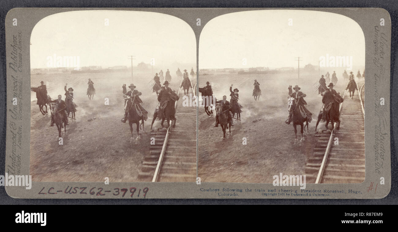 Cowboys Following Train and Cheering President Theodore Roosevelt, Hugo, Colorado, USA, Stereo Card, Underwood & Underwood, June 12, 1903 Stock Photo