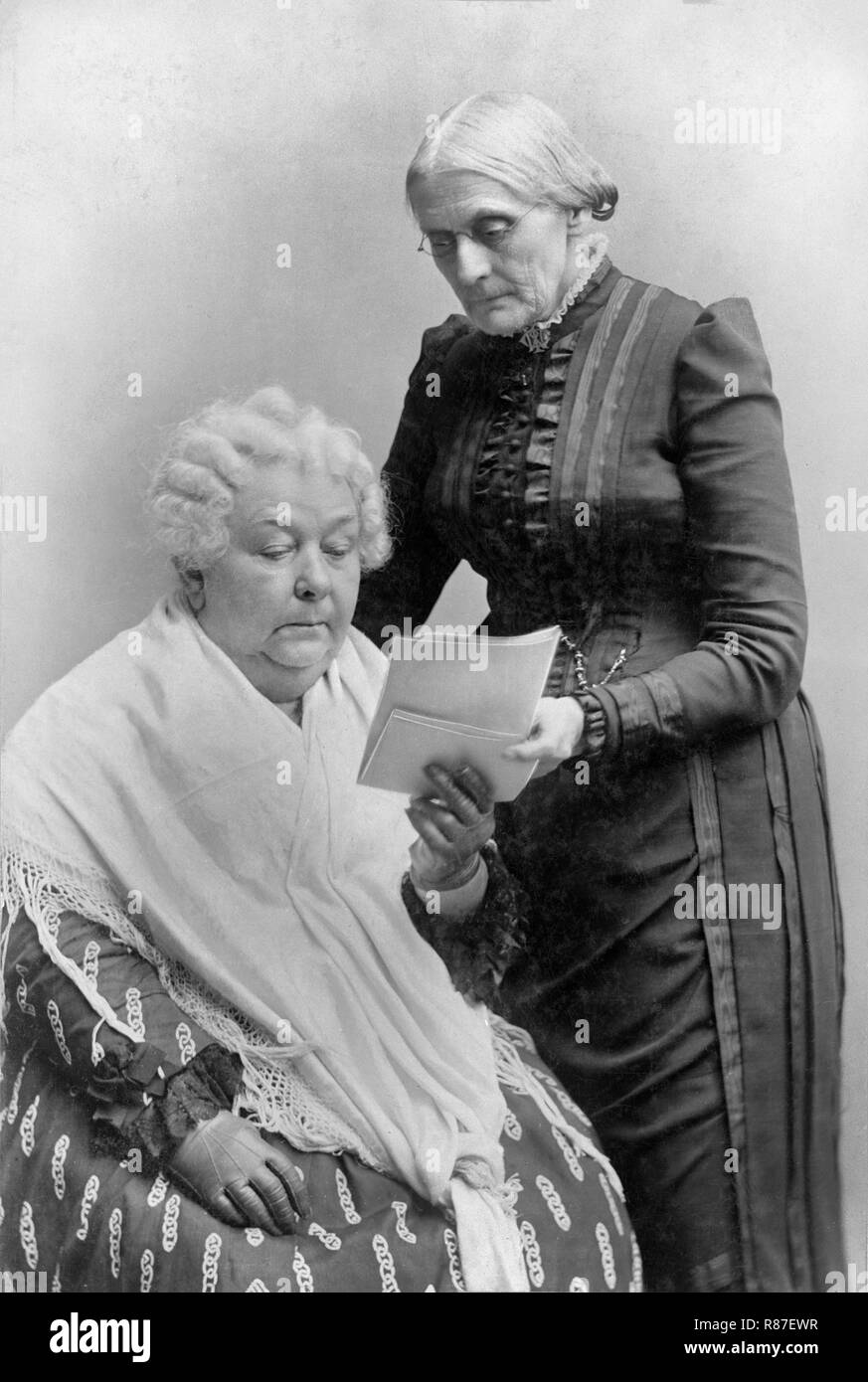 Elizabeth Cady Stanton (1815-1902), Seated, and Susan B. Anthony (1820-1906), Standing, three-quarter length Portrait, 1900 Stock Photo