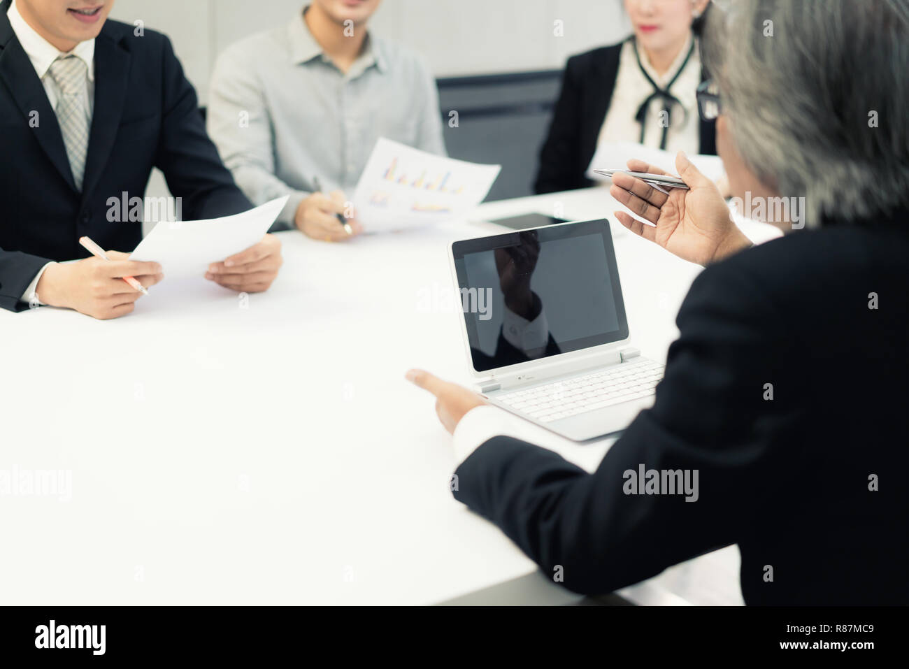 Business team present. Photo professional investor working new startup business project. Finance business meeting. Digital tablet laptop computer smar Stock Photo