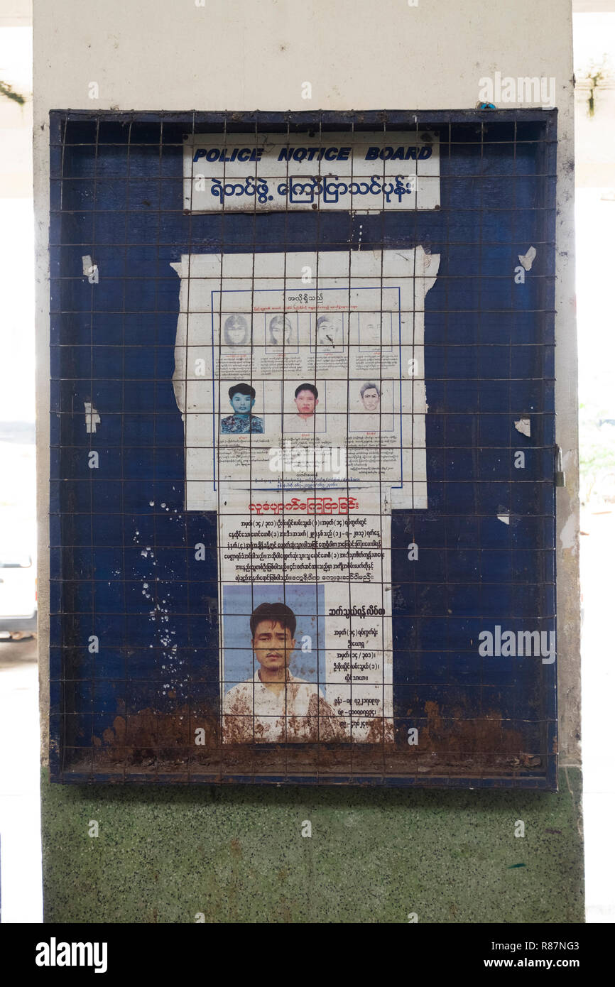 Wanted posters at the Central Railway station in Yangon, Myanmar. Stock Photo