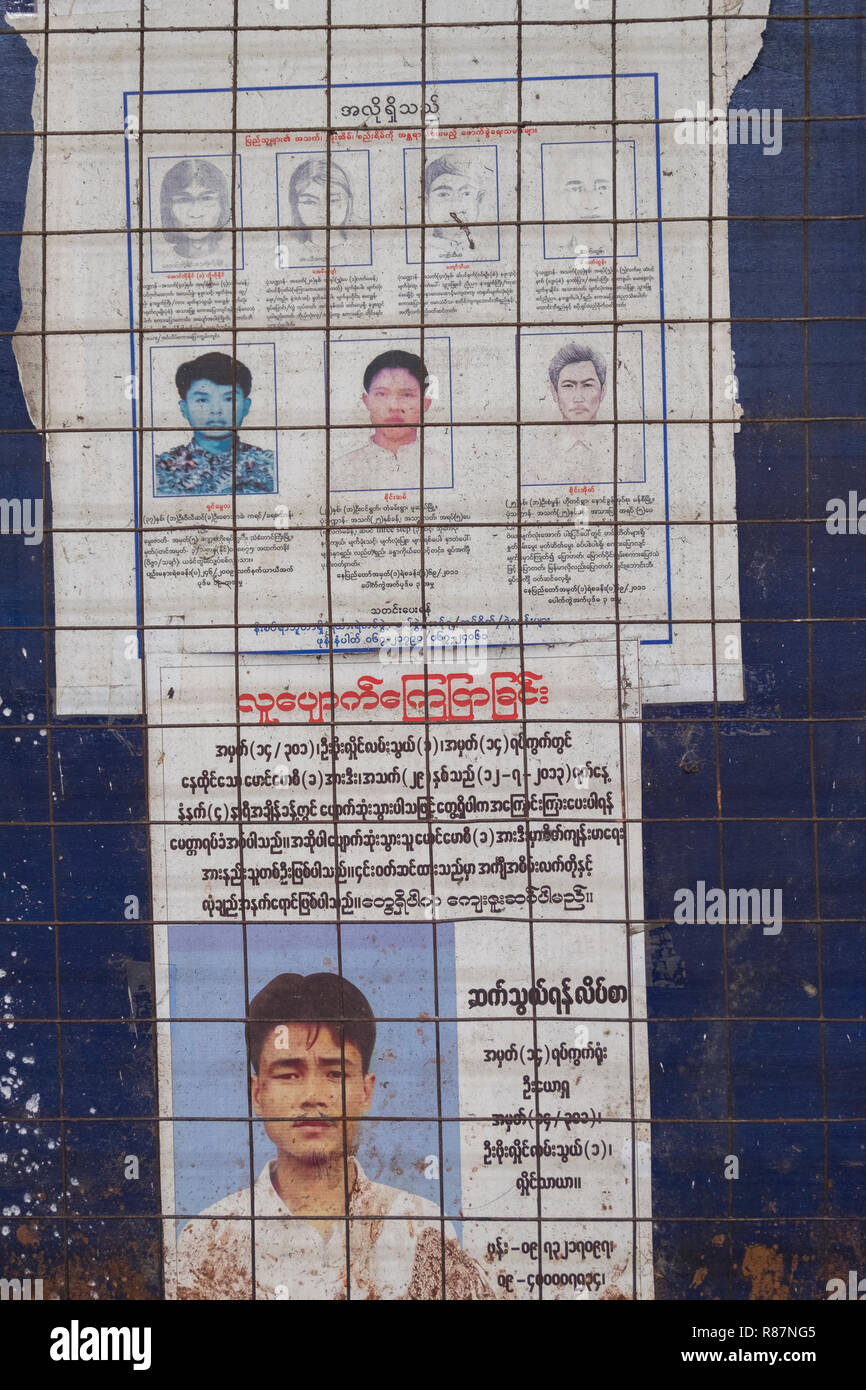 Wanted posters at the Central Railway station in Yangon, Myanmar. Stock Photo