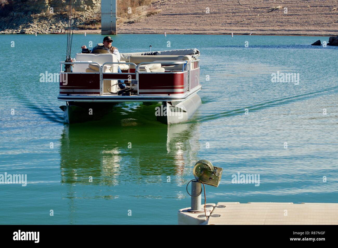 Pontoon Fishing Boat on Lake McKinsey near Amarillo, Texas. Stock Photo