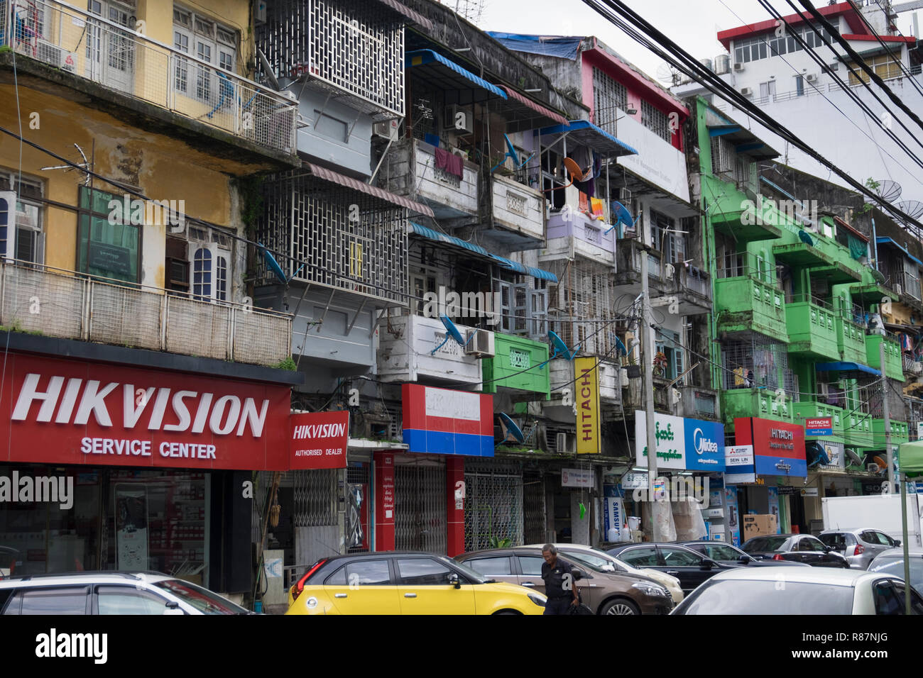 Interesting building facade, showing the gritty urban fabric, in Yangon, Myanmar. Stock Photo