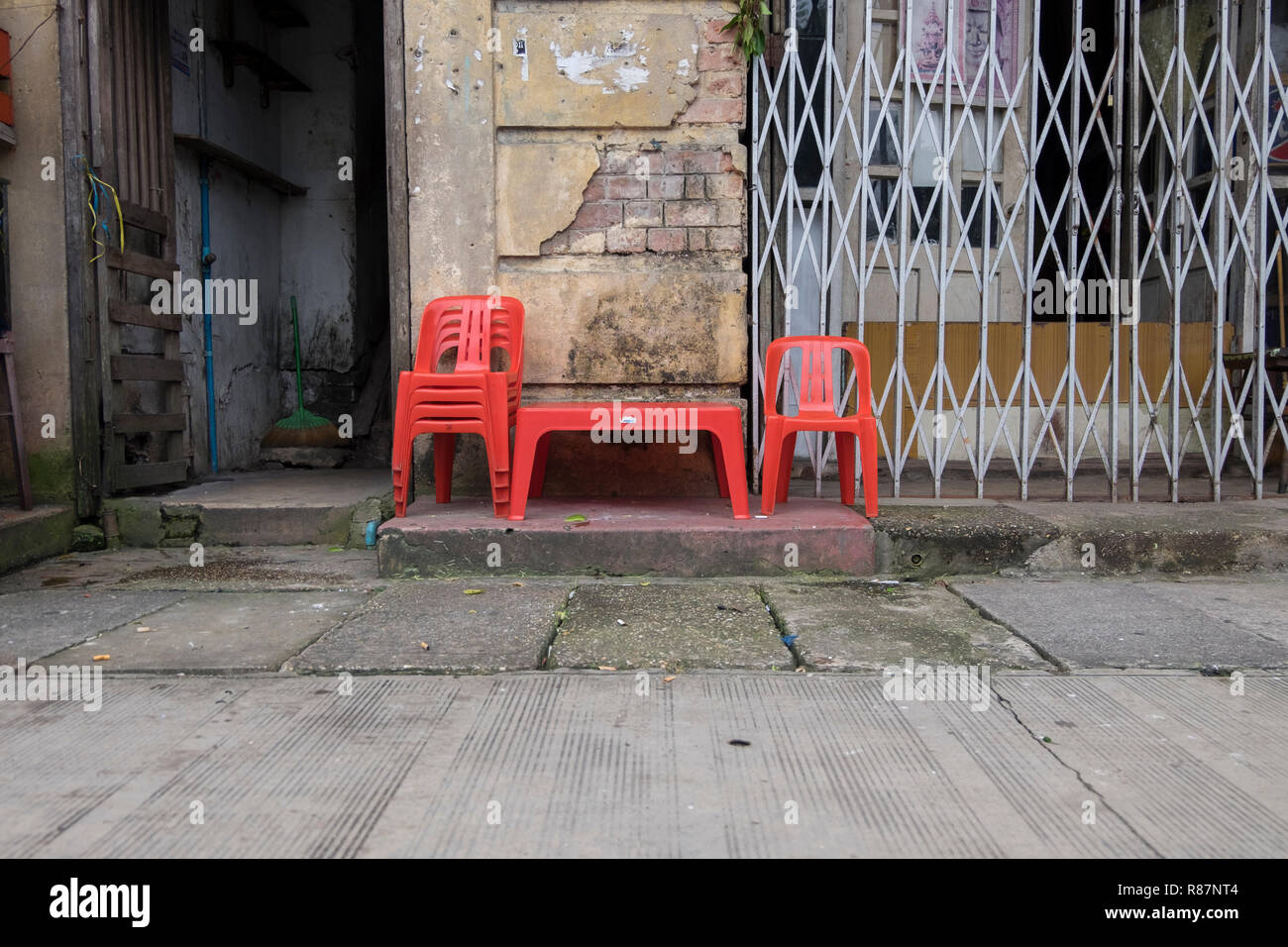 A humble table and chair set in Yangon, Myanmar. Stock Photo