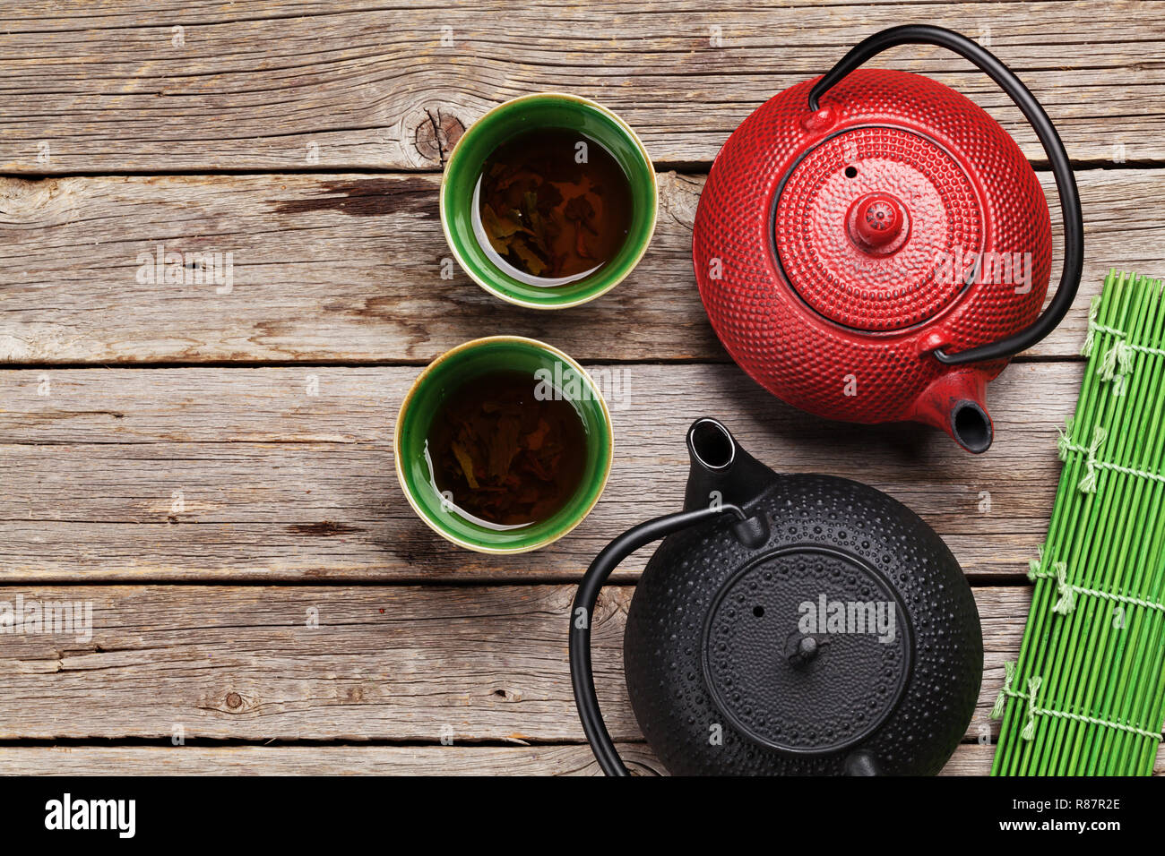 Herbal green tea and teapots. Top view with space for your text Stock ...