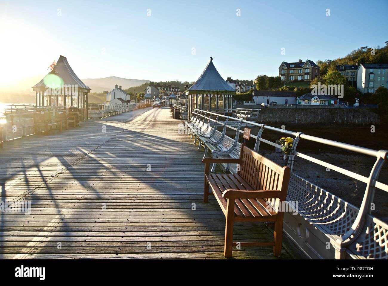 A view of the seating and kiosks on Bangor Pier at dawn, Bangor, Gwynedd, North Wales, UK Stock Photo