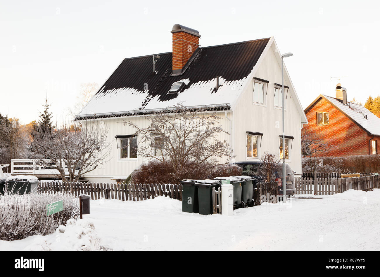 Sodertalje, Sweden - January 17, 2016: Winter in the one family housing ressidential area with buildings of the 1950s era Stock Photo