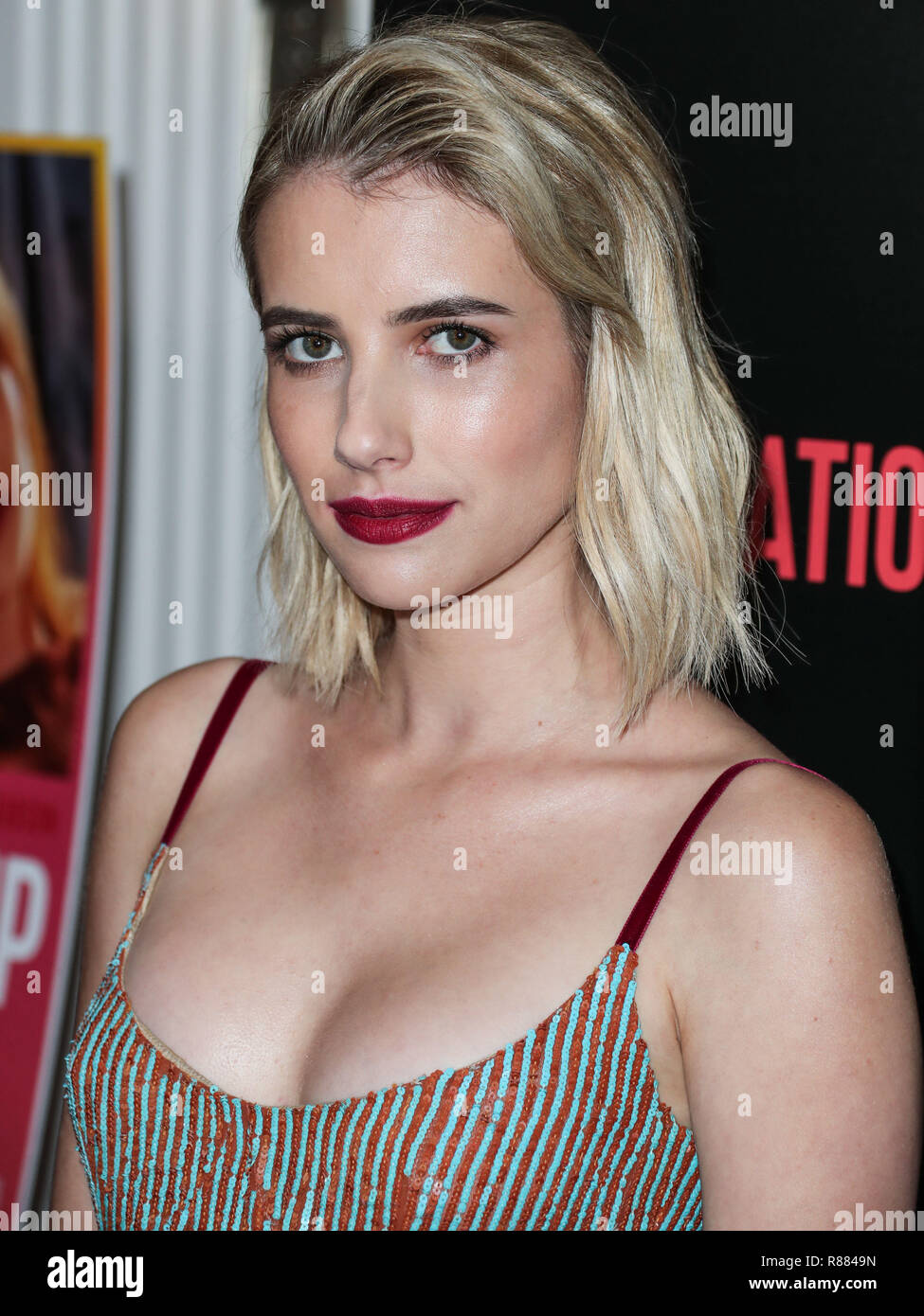 WEST HOLLYWOOD, LOS ANGELES, CA, USA - OCTOBER 30: Actress Emma Roberts wearing a Markarian dress, Christian Louboutin heels, and Irene Neuwirth jewelry arrives at the Los Angeles Premiere Of Vertical Entertainment's 'In A Relationship' held at The London West Hollywood Screening Room on October 30, 2018 in West Hollywood, Los Angeles, California, United States. (Photo by Xavier Collin/Image Press Agency) Stock Photo