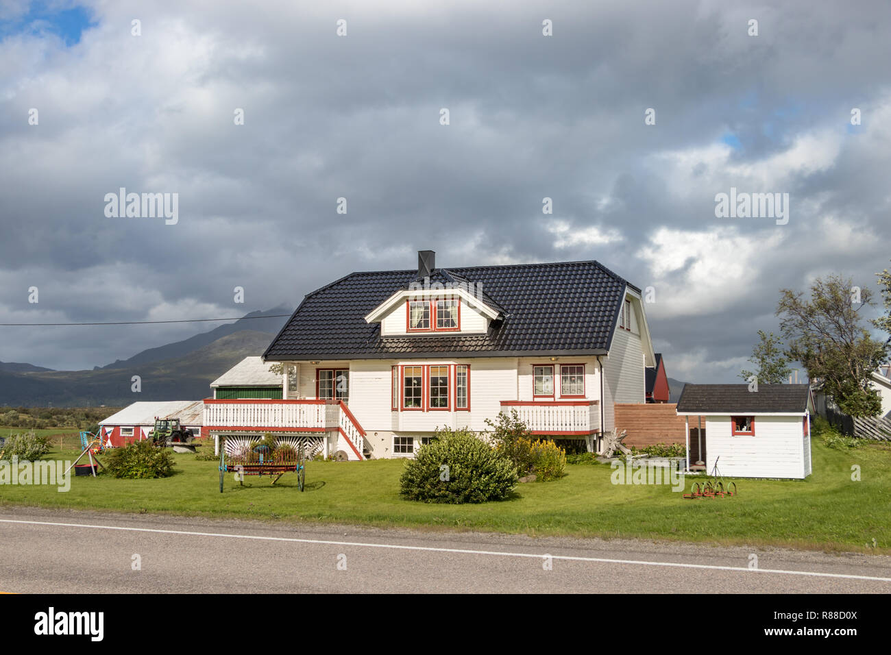 Leknes, Norway - August 23th, 2018: A beautiful house in a road of Leknes, Lofoten, Norway. Stock Photo