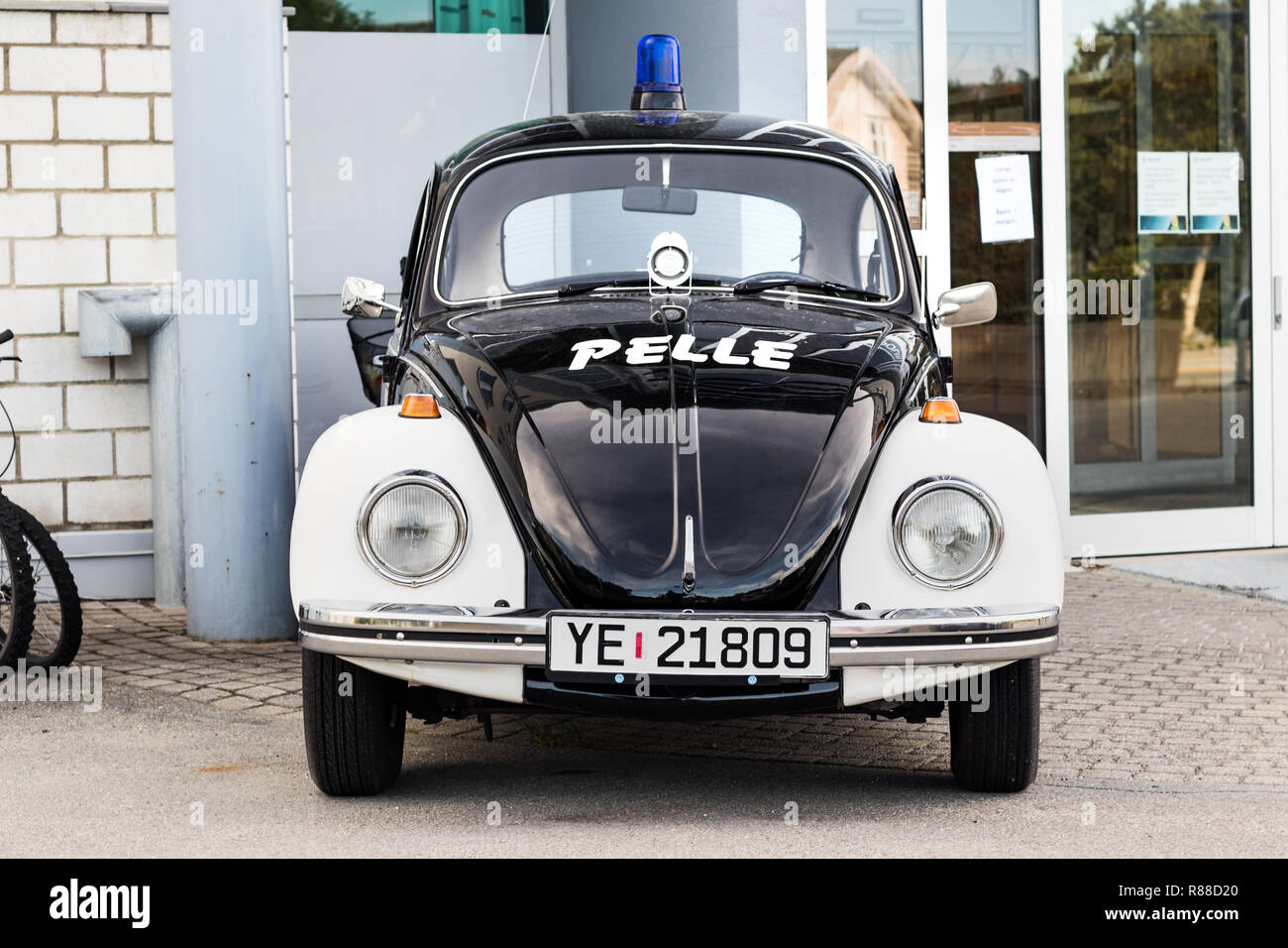 Bodo, Norway - August 2th, 2018: A Volkswagen beetle vintage police car at the entrance of the police department in Bodo, Norway. Stock Photo